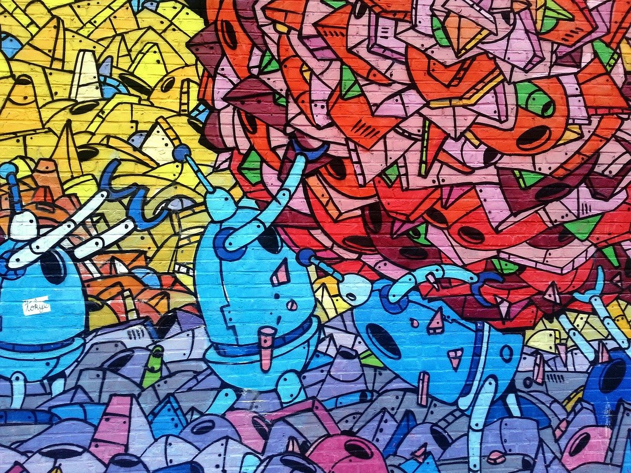Kleurrijke muurschildering met abstracte figuren